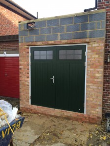 Side hinged garage doors installed by Byron Doors in Pinner, London.