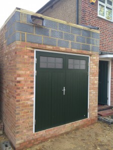 Side hinged garage doors installed by Byron Doors in Pinner, London.