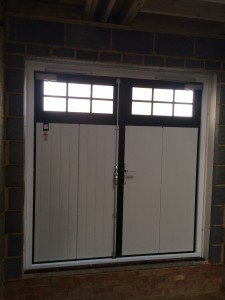 Side hinged garage doors installed by Byron Doors in Pinner, London.