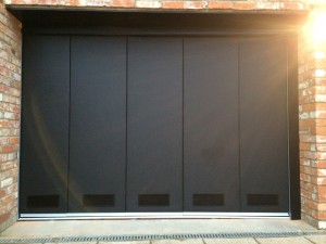 Byron Doors installation of a Ryterna side sliding garage door in Dachett, Berkshire.