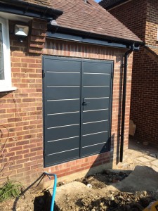 Side hinged garage doors installed by Byron Doors in Finchley, London.