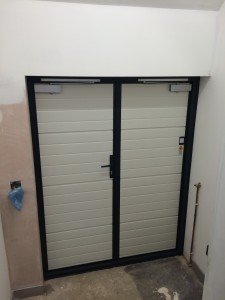 Side hinged garage doors installed by Byron Doors in Finchley, London.